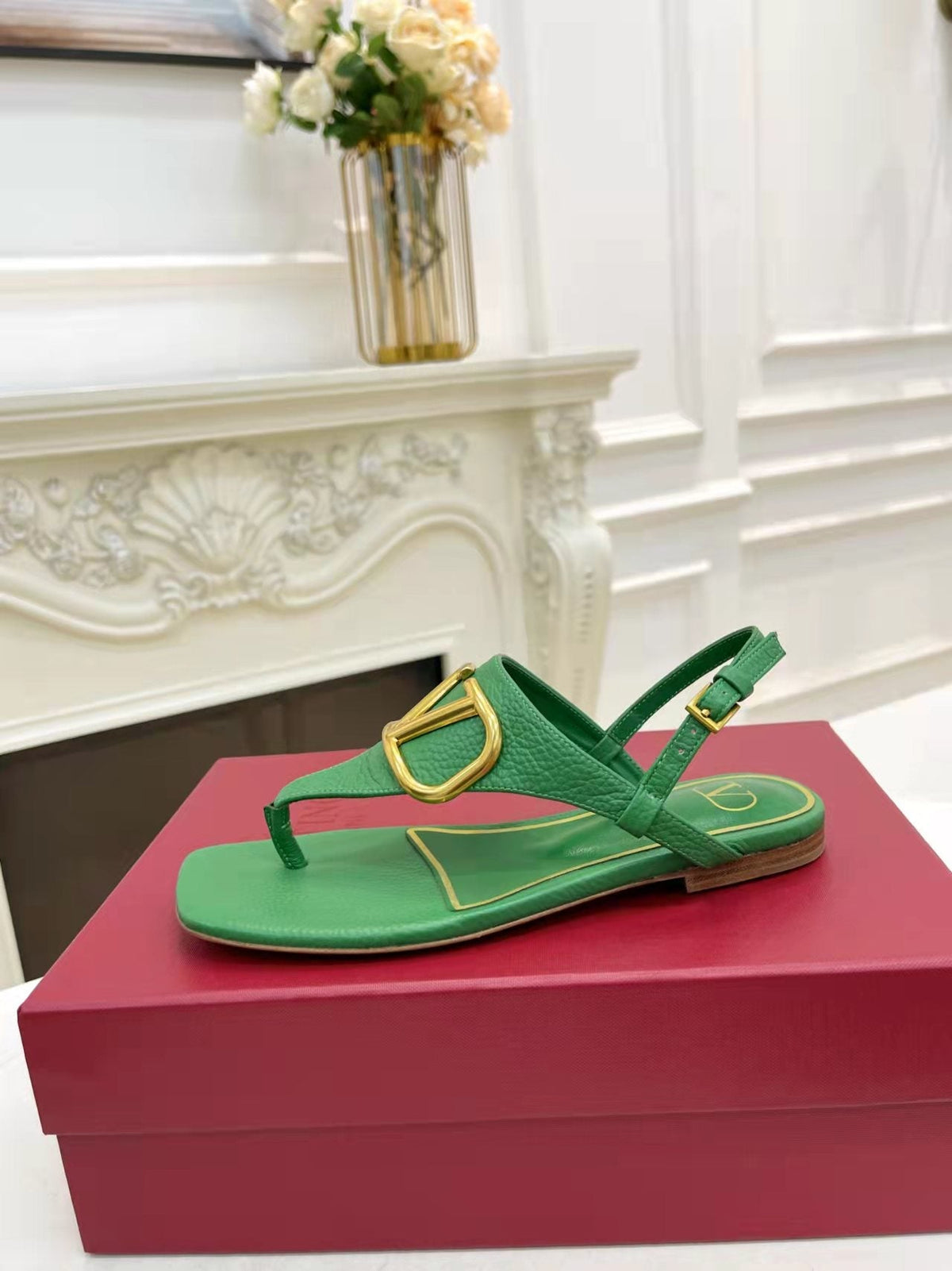 THONG SANDALS IN EMERALD GREEN CALFSKIN WITH GOLD LOGO