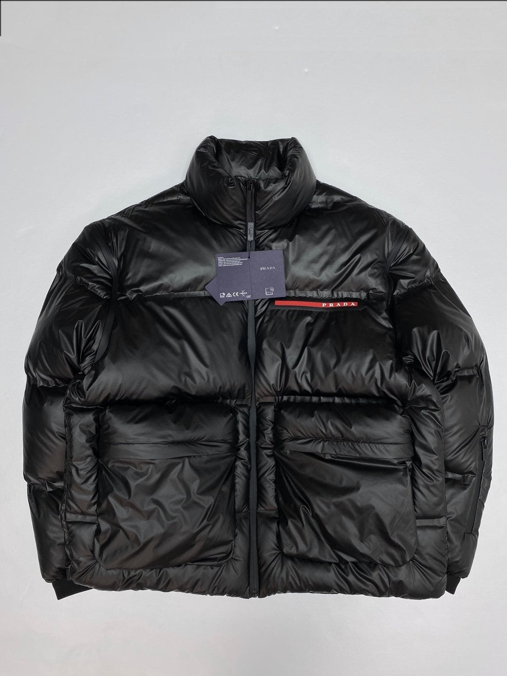 Prada Black Convertible Puffer Jacket with Red Chest Stripe